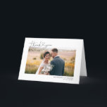 Modern Script Heart Wedding Photo Thank You Card<br><div class="desc">Elegant and simple wedding thank you folded greeting card featuring a hand lettered typography script text with a heart between the words. This casual script and the white space gives a simple and minimalistic feel. Customise this product by inserting your own wedding photo and editing the message inside the card....</div>