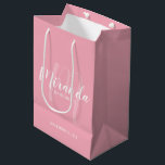 Modern Script Personalised Bridesmaid Blush Pink Medium Gift Bag<br><div class="desc">Personalised Bridesmaids Gift Bag featuring personalised bridesmaid's name in white modern script font style and monogram in light blush pink modern script font style as background with title and wedding date in white modern sans serif font style on blush pink background. Also perfect for maid of honour, flower girl, mother...</div>