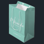 Modern Script Personalised Bridesmaid Mint Green Medium Gift Bag<br><div class="desc">Personalised Bridesmaids Gift Bag featuring personalised bridesmaid's name in white modern script font style and monogram in light mint green modern script font style as background with title and wedding date in white modern sans serif font style on mint green background. Also perfect for maid of honour, flower girl, mother...</div>