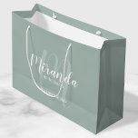 Modern Script Personalised Bridesmaids Large Gift Bag<br><div class="desc">Personalised Bridesmaids Gift Bag featuring personalised bridesmaid's name in white modern script font style and monogram in sage green modern script font style as background with title and wedding date in white modern sans serif font style on sage green background. Also perfect for maid of honour, flower girl, mother of...</div>