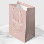 Modern Script Personalised Bridesmaids Medium Gift Bag<br><div class="desc">Personalised Bridesmaids Gift Bag featuring personalised bridesmaid's name in white modern script font style and monogram in blush pink modern script font style as background with title and wedding date in white modern sans serif font style on blush pink background. Also perfect for maid of honour, flower girl, mother of...</div>