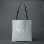 Modern Script Personalised Bridesmaids Tote Bag<br><div class="desc">Modern Script Personalised Bridesmaids Tote Bag
featuring personalised bridesmaid's name in white modern script font style with title and wedding date in modern sans serif font style on sage green background.

Also perfect for Maid of Honour,  Flower Girl,  Mother of the Bride and more.</div>
