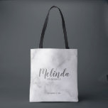 Modern Script Personalised Bridesmaids Tote Bag<br><div class="desc">Modern Script Personalised Bridesmaids Tote Bag
featuring personalised bridesmaid's name in grey modern script font style with title and wedding date in modern sans serif font style on white marble background.

Also perfect for Maid of Honour,  Flower Girl,  Mother of the Bride and more.</div>
