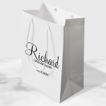 Modern Script Personalised Groomsman Medium Gift Bag<br><div class="desc">Personalised Groomsman Gifts
featuring personalised groomsman's name in black modern script font style with title and wedding date in modern sans serif font style.

Also perfect for best man,  father of the bride,  bridesmaid,  maid of honour,  mother of the bride and more.</div>