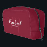 Modern Script Personalised Groomsman Monogram Name Dopp Kit<br><div class="desc">Add a personal touch to your wedding with personalised groomsman gift. This design features personalised groomsman's name in white modern script font style and monogram in light burgundy red modern script font style as background with title in white modern sans serif font style on burgundy red background. Also perfect for...</div>