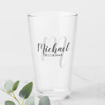 Modern Script Personalised Groomsmen Glass<br><div class="desc">Add a personal touch to your wedding with personalised groomsmen glass. This glass features personalised groomsmen's name in grey modern script font style and monogram in light grey modern script font style as background with title in grey modern sans serif font style. Also perfect for best man, father of the...</div>