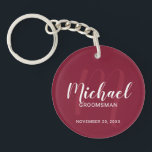 Modern Script Personalised Groomsmen Monogram&Name Key Ring<br><div class="desc">Add a personal touch to your wedding with personalised groomsmen keychain. This keychain features personalised groomsmen's name in white modern script font style and monogram in light burgundy red modern script font style as background with title and wedding date in white modern sans serif font style on burgundy red background....</div>