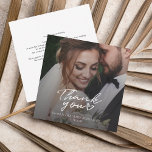 Modern Script Photo Wedding Thank You Card<br><div class="desc">Perfect for expressing gratitude to your guests, this card can be customised with your heartfelt message, allowing you to share a piece of your joyous celebration while conveying your appreciation. Whether you opt for a romantic sunset shot, a candid laugh, or a classic pose, this thank you card serves as...</div>