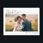 Modern Script with Heart Wedding Thank You Photo Postcard<br><div class="desc">Elegant and simple wedding thank you template card featuring a hand lettered typography script text with a heart between the words. This casual script and the white space gives a simple and minimalistic feel. Customise this product by inserting your own wedding photo and editing the message on the back of...</div>