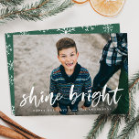 Modern Shine Bright Script Green Photo Holiday Card<br><div class="desc">Wish friends and family a happy holiday season with our trendy and modern Shine Bright holiday greeting card. The cute holiday card displays your photo on the front with "Shine Bright" in a white, painted brush script overlay with a short greeting and your name below. The back of the card...</div>