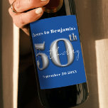 Modern Simple Royal Blue and Silver 50th Birthday Wine Label<br><div class="desc">Celebrate the golden milestone with this elegant 50th birthday wine bottle label! The label is adorned with a rich, royal blue background that beautifully contrasts the metallic silver text. “Cheers to Benjamin’s 50th Birthday” is gracefully inscribed in a mix of classic and cursive fonts, capturing the essence of celebration and...</div>