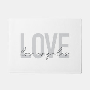 Modern, simple, urban design of Love Los Angeles Doormat