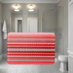 Modern striped design in various shades of red bath mat
