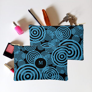 Modern, trendy blue circles on black monogram accessory pouch