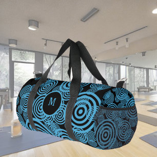 Modern, trendy blue circles on black monogram duffle bag