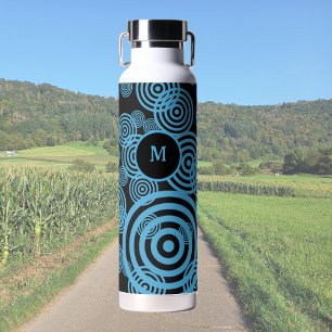 Modern, trendy blue circles on black monogram water bottle