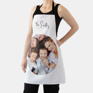 Modern Trendy Script Family Name Round Photo Apron