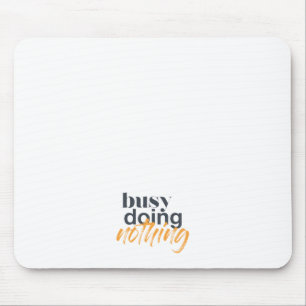 Modern, trendy, urban design of Busy Doing Nothing Mouse Mat