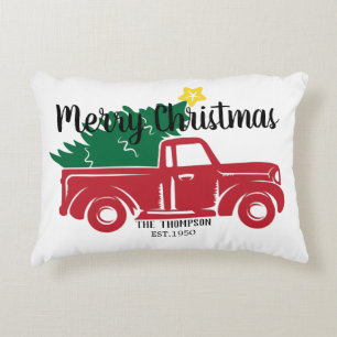 Modern vintage red truck with pine tree green decorative cushion