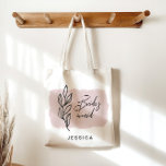 Modern Watercolor Floral Blush Bridesmaid Tote Bag<br><div class="desc">Modern watercolor illustration featuring a brush stroke and simple sketched florals combined with an elegant handwritten script "bridesmaid" for a perfect wedding favour gift. Monogram is in sans serif font and is easily personalised.</div>