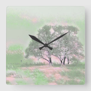 Modern watercolor of coloured snowed trees square wall clock