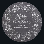 Modern White Christmas Wreath Black Chalkboard Classic Round Sticker<br><div class="desc">This black and white Christmas sticker takes the traditional chalkboard style and adds a modern touch. The Christmas wreath is drawn in the popular open style. Merry Christmas is also written in a contemporary font. Your name is below. Easy-to-use template. All of the text can be quickly changed.</div>