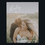Modern White Handwritten Script Wedding Photo Faux Canvas Print<br><div class="desc">Modern wedding faux canvas print with a simple design featuring your names in an elegant handwritten script across the top left and your wedding date in the bottom right, over your favourite photo. The chic hand lettering adds a romantic touch. Display your favourite engagement picture at your reception or give...</div>