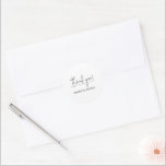 Modern White Wedding Thank You Classic Round Sticker<br><div class="desc">A small white round sticker features "thank you" in a chic black handwritten script with your names below,  perfect for any wedding occasion - reception,  rehearsal dinner,  engagement party,  couple's shower and more.</div>
