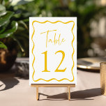 Modern Yellow Wavy Frame Wedding Table Number<br><div class="desc">Add a stylish touch to your wedding celebration with these Modern Wavy Frame wedding table cards! The retro design displays "Table" in a handwritten yellow script with the table number shown below. A yellow wavy border surrounds the table number contrasting with a white background. The design repeats on the back....</div>