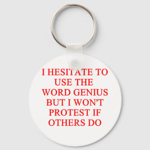 modest genius joke key ring