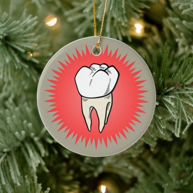 Molar freshly extracted on a red starburst ceramic tree decoration (Tree)
