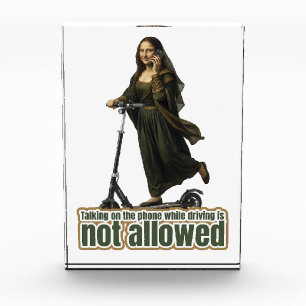Mona Lisa on the phone riding a kick scooter Photo Block