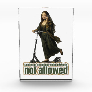 Mona Lisa on the phone  riding a kick scooter Photo Block