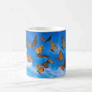 Monarch butterflies in the sky coffee mug