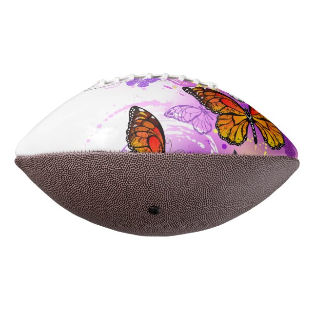 Monarch Butterflies on Purple Background American Football (Rotated 270)