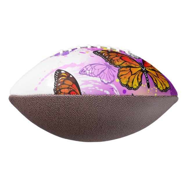 Monarch Butterflies on Purple Background American Football (Rotated 270)