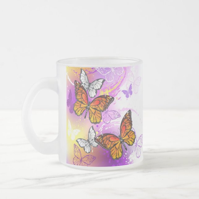 Monarch Butterflies on Purple Background Frosted Glass Coffee Mug (Left)
