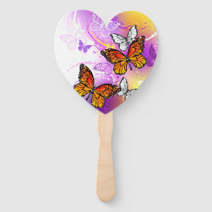 Monarch Butterflies on Purple Background Hand Fan