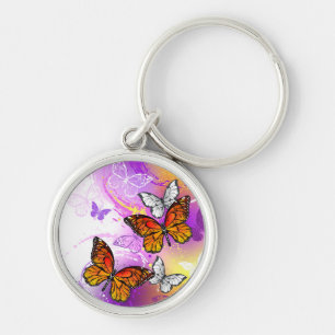 Monarch Butterflies on Purple Background Key Ring