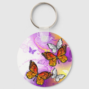 Monarch Butterflies on Purple Background Key Ring