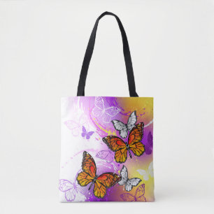 Monarch Butterflies on Purple Background Tote Bag
