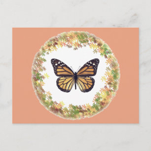 Monarch butterfly in frame of leaves postcard