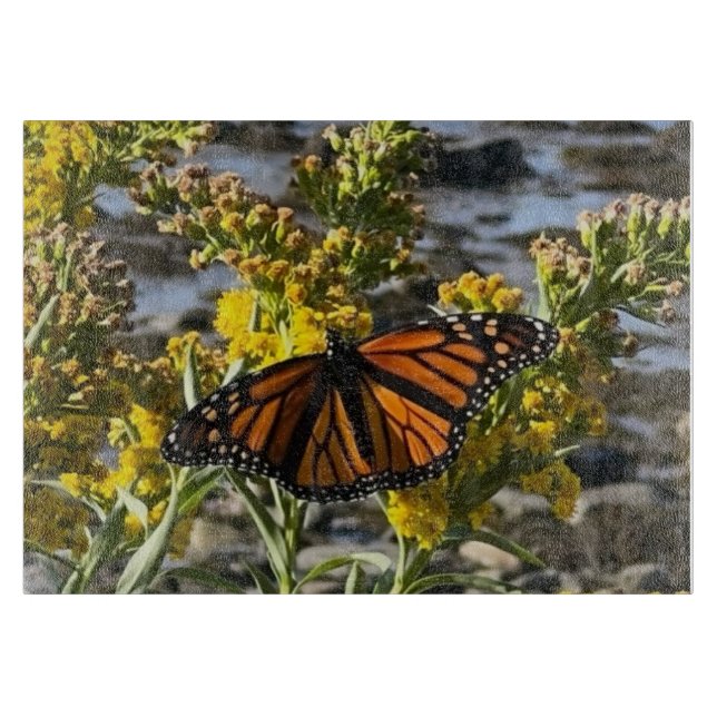 Monarch Butterfly on a Flower by the Water Nature Cutting Board (Front)