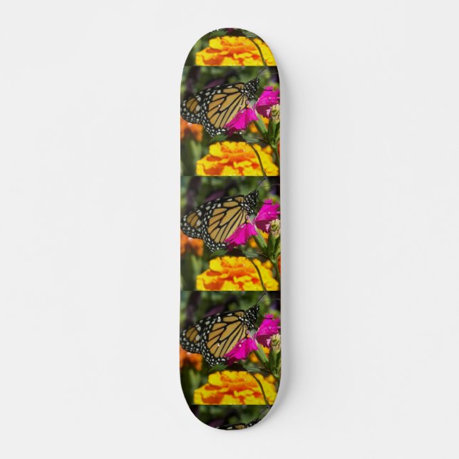 Monarch butterfly on pink marigold-skateboard skateboard (Front)