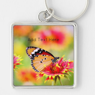Monarch Butterfly on Red and Yellow Flower Key Ring
