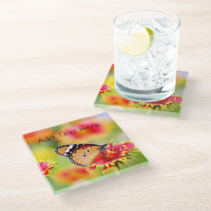 Monarch Butterfly on Red and Yellow Flowers Glass Coaster