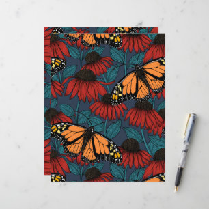 Monarch butterfly on red coneflowers