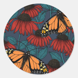 Monarch butterfly on red coneflowers classic round sticker