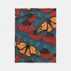 Monarch butterfly on red coneflowers fleece blanket