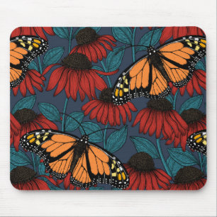 Monarch butterfly on red coneflowers mouse mat